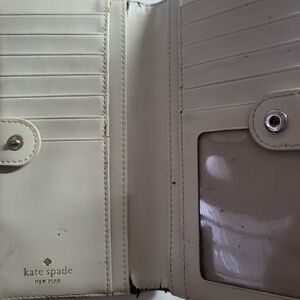 Kate Spade gold metal wallet.